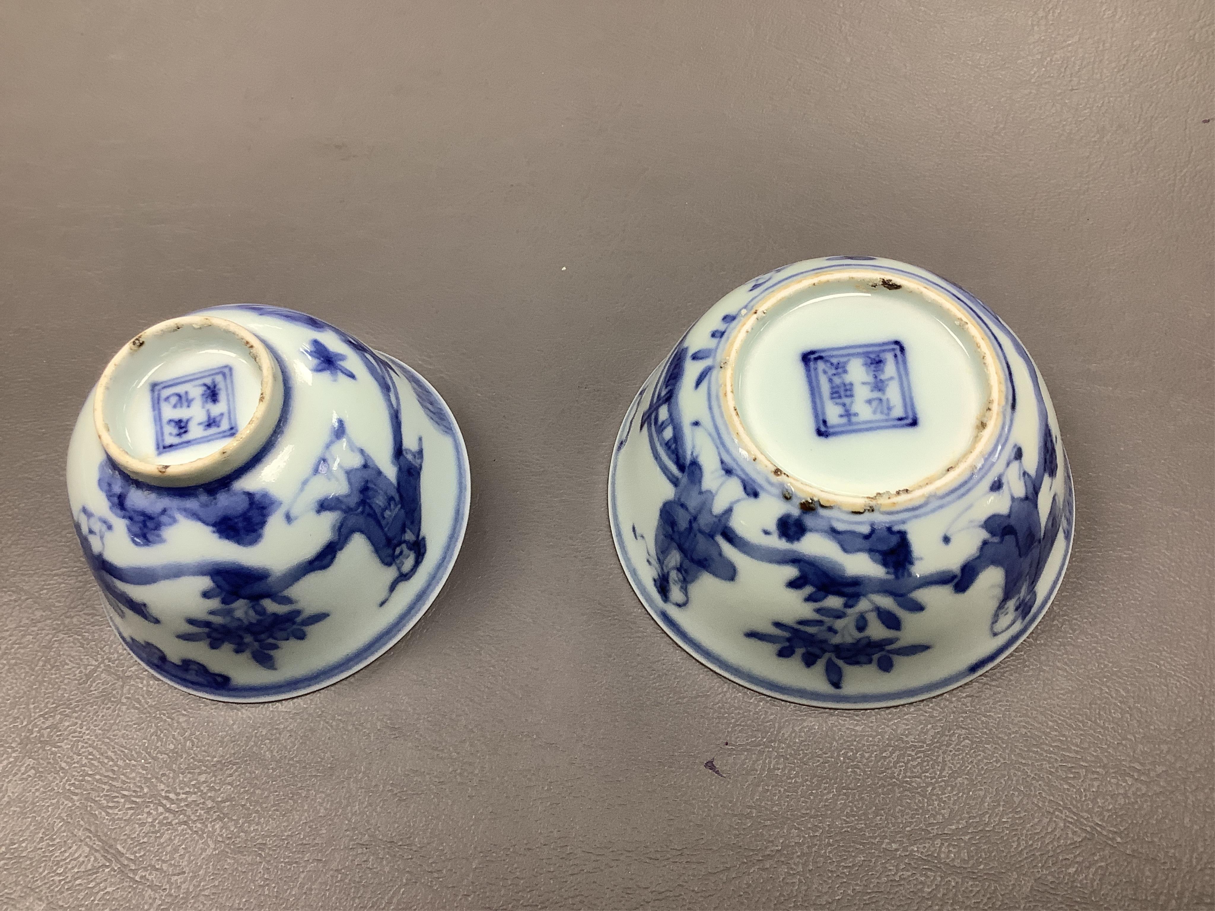 Four Chinese blue and white tea bowls and another (a.f.)